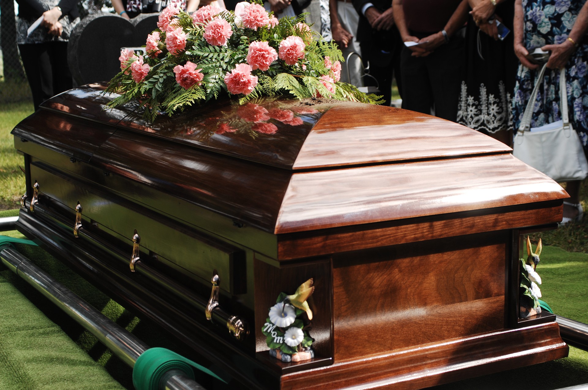 Coffin at a funeral service in a cemetery